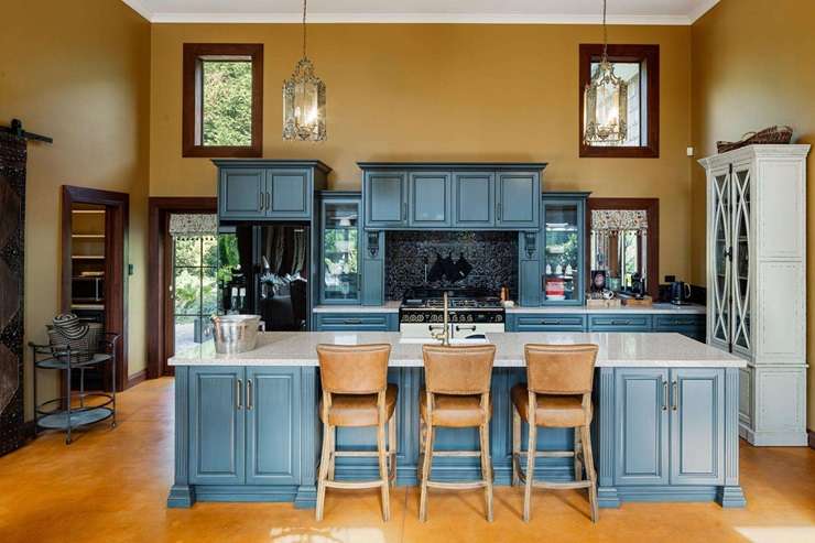 Corina Montgomery and David Lawrence are selling their French chateau, which looks centuries old but was completed in 2018. Photo / Supplied