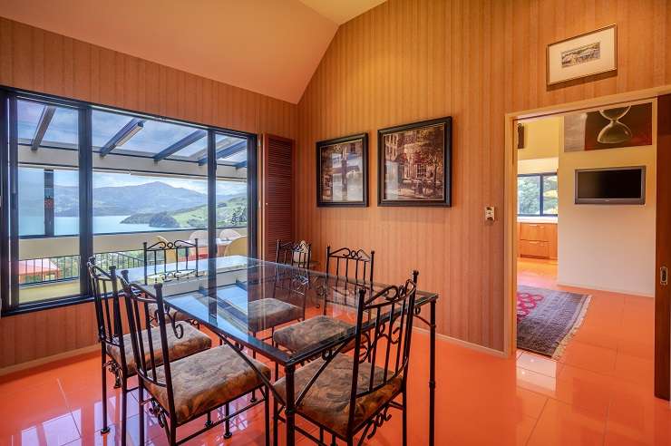 The three-bedroom home on Purple Peak Road, in Akaroa, Banks Peninsula, sold under the hammer. Photo / Supplied