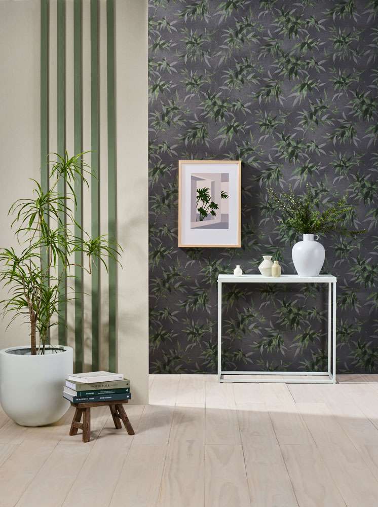 Natural-hued wood slats add freshness and a soft texture to this neutral living space. The rear wall is painted in Resene Concrete with wooden slat feature finished in Resene Colorwood Bask. Project by Vanessa Nouwens, image by Bryce Carleton.