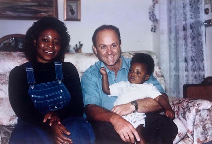 Ray White agent Oscar Jnr Obiaho reconnects with Etienne and Sandy de Haast, the couple who cared for him and his mother. Photo / Supplied