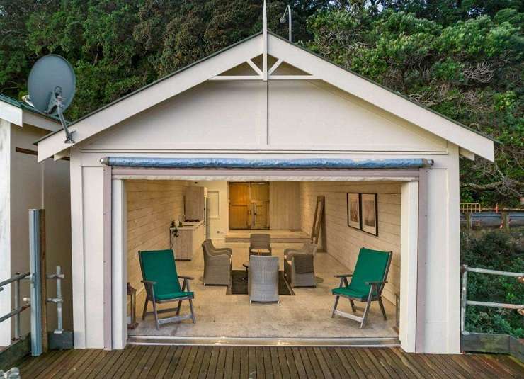 boatsheds on water with trees behind  Boatshed 20 1 Ngapipi Road, Orakei, Auckland on Hobson Bay