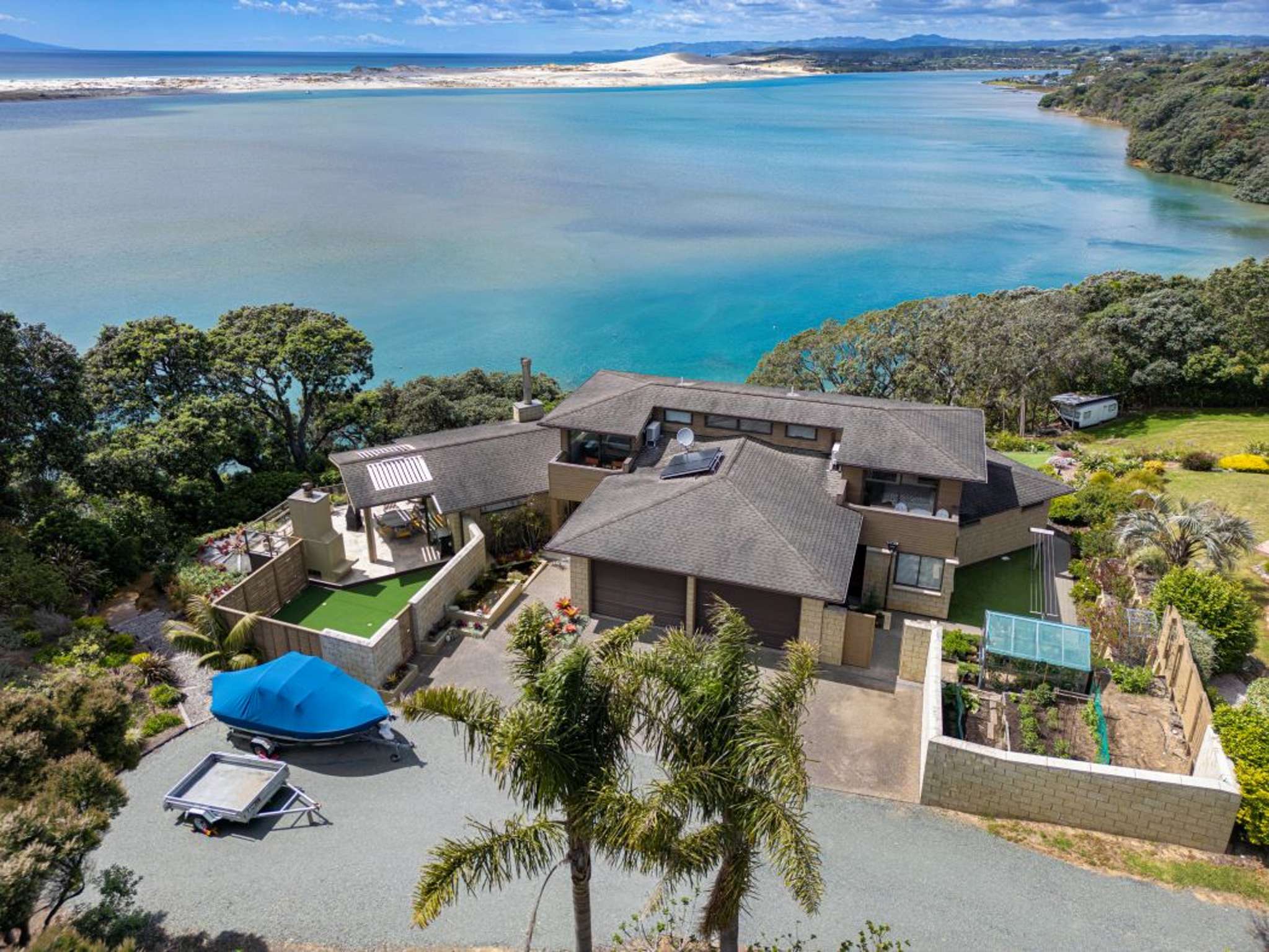 Couple selling seaside Mangawhai Heads getaway they built for their retirement