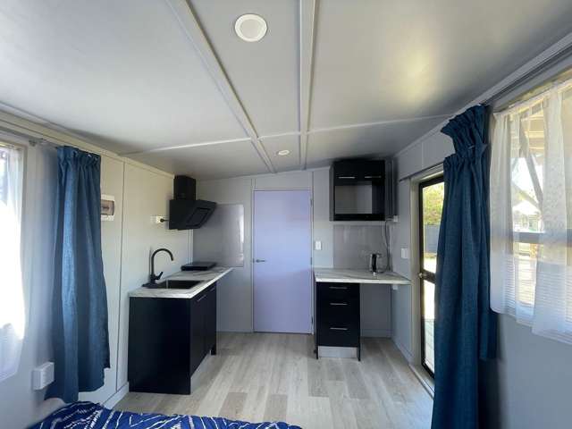 NEW STUDIO – NO POWER BILLS!  Pets allowed
