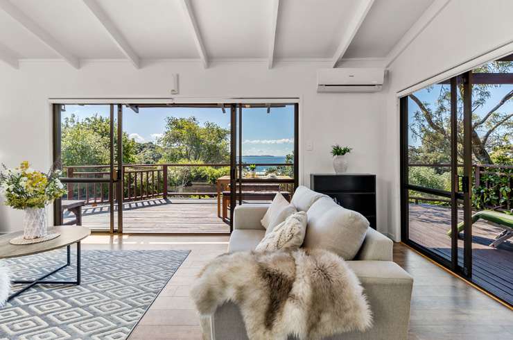 A four-bedroom house on Hill Road, in Palm Beach, with views of the beach and Hauraki Gulf, sold under the hammer for $6.031m. Photo / Supplied