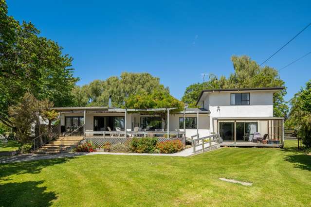 Private Riverside Retreat. Development Opportunity