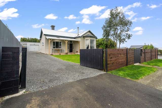 Renovated and Ready With Large Garaging!