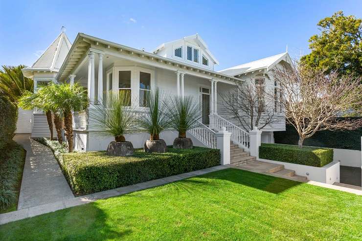 ornate two-storey villa with balcony and brick wall  27 Herne Bay Road, Herne Bay, Auckland