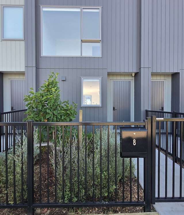 Modern Terrace Home across a Modern Primary School