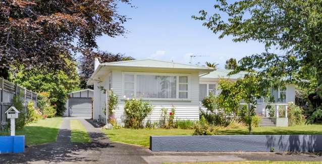 Solid 1960s Home with Space, Privacy & Potential