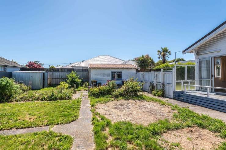 The four-bedroom, one-bathroom 1930s bungalow at 83 Blighs Road, in Strowan, Christchurch, heads to auction next week. Photo / Supplied