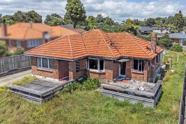 Fire-damaged home in South Auckland to sell at a major loss