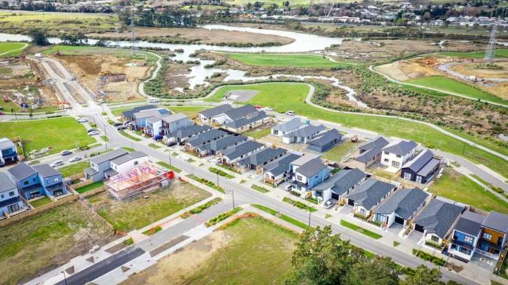 An aerial view of houses in Tauranga, one of the property hotspots buyers are encouraged to check out in 2024. Photo / Getty Images