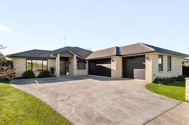 Brick Beauty with Triple Car Garaging