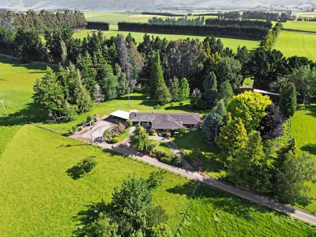 PARK LIKE SETTING, HOME & LAND