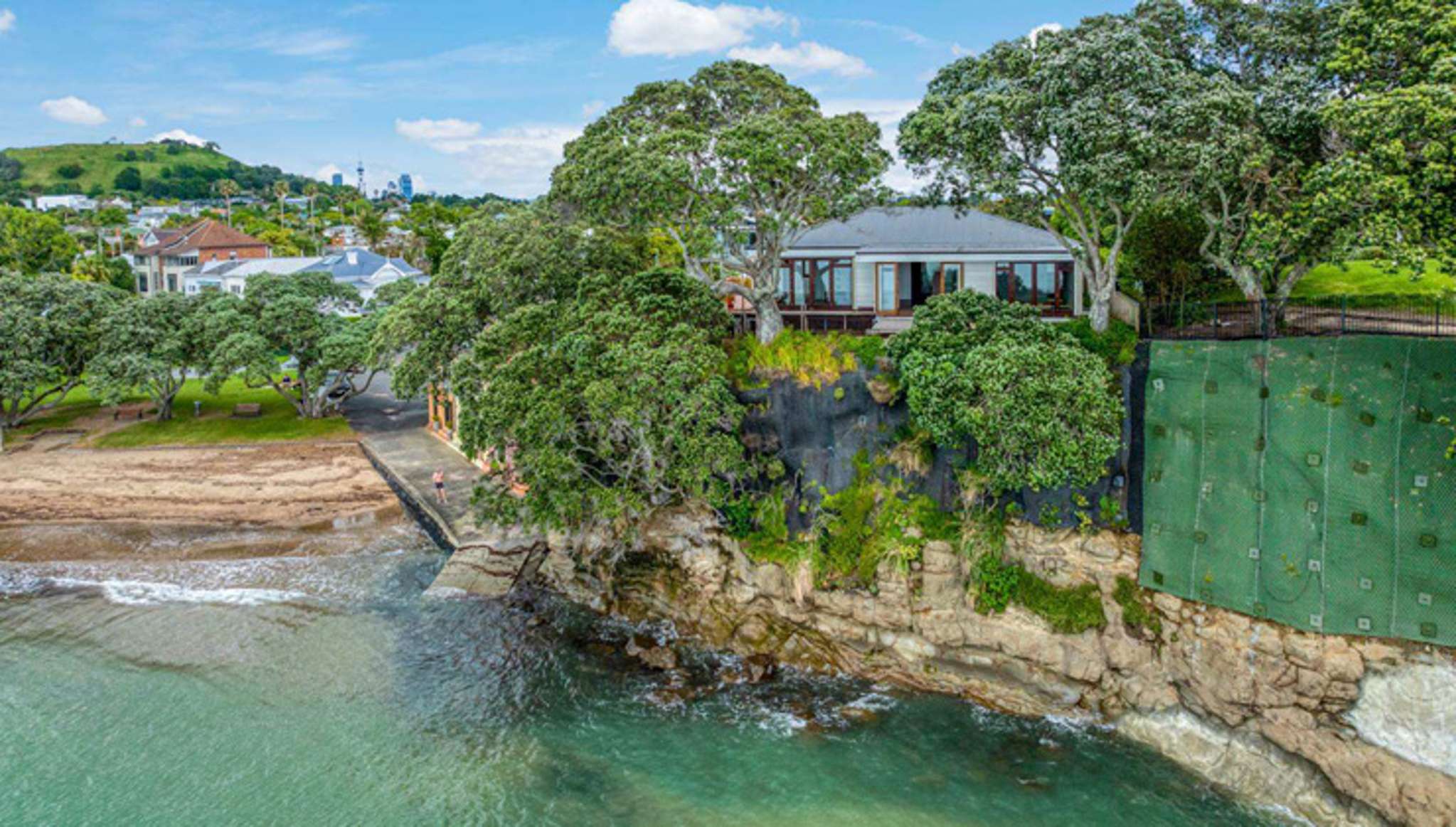 Mystery surrounds fate of cliff-top house in rich-lister neighbourhood