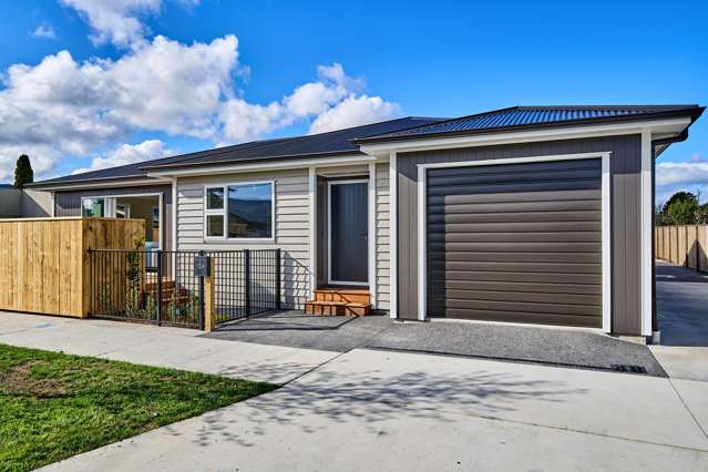 Brand new, single level and full of sun!