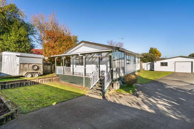 Charming Three‑Bedroom Home with Excellent Garaging