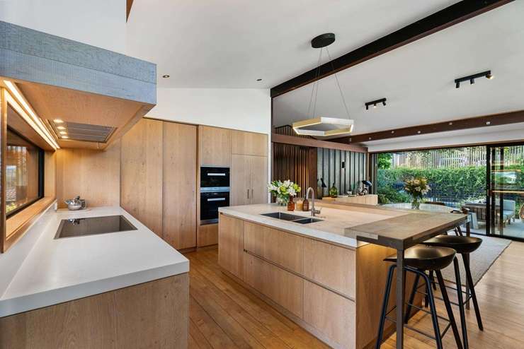 The cedar-and-concrete block house at 24 Crocus Place, in Auckland’s Remuera, was designed by architect David Allison, an associate of the famous Group Architects, in 1969. Photo / Supplied