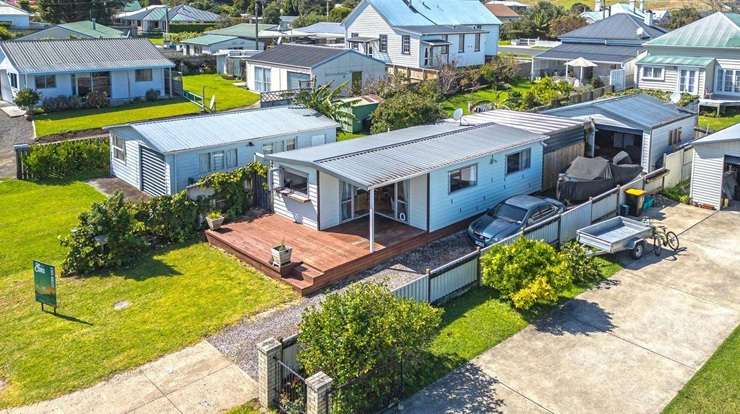 A three-bedroom, two-bathroom holiday home directly across from the beach in Wyuna Bay has been tipped as the town's