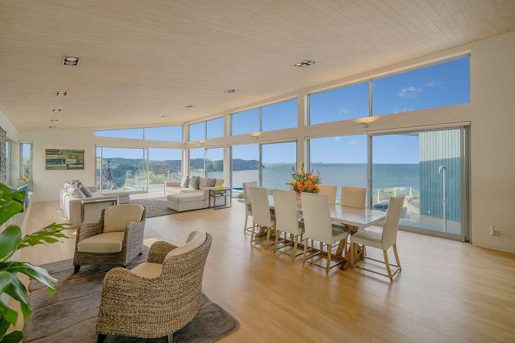 A luxury five-bedroom, six-bathroom home which overlooks Hot Water Beach in the Coromandel is going to auction on June 6. Photo / Supplied