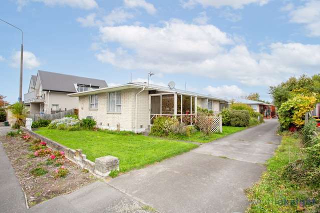 Sharp Price, Ideal Location! Add Some TLC