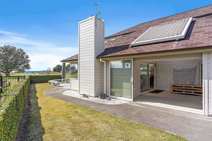 A beachfront stunner on Kenwood Drive, in Matarangi, was snapped up by a family with ties to the town. Photo / Supplied