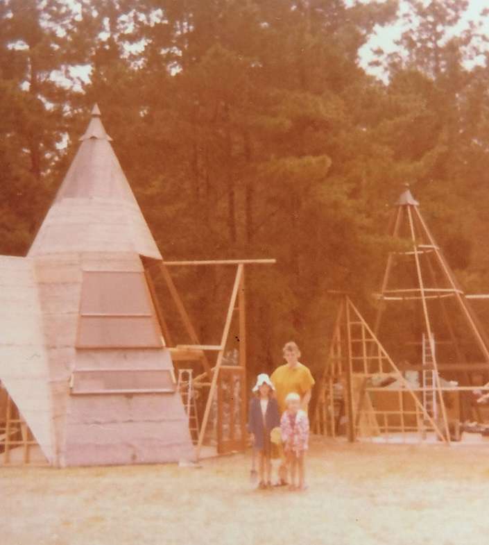 The Witch Hat houses are so iconic they even featured on a Pauanui postcard in the 1980s.  Photo / Supplied