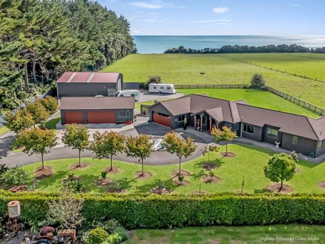 Executive Coastal Lifestyle with Sheds & Sea Views