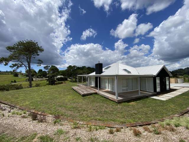 Luxury four bedroom plus office family home in Dairy Flat