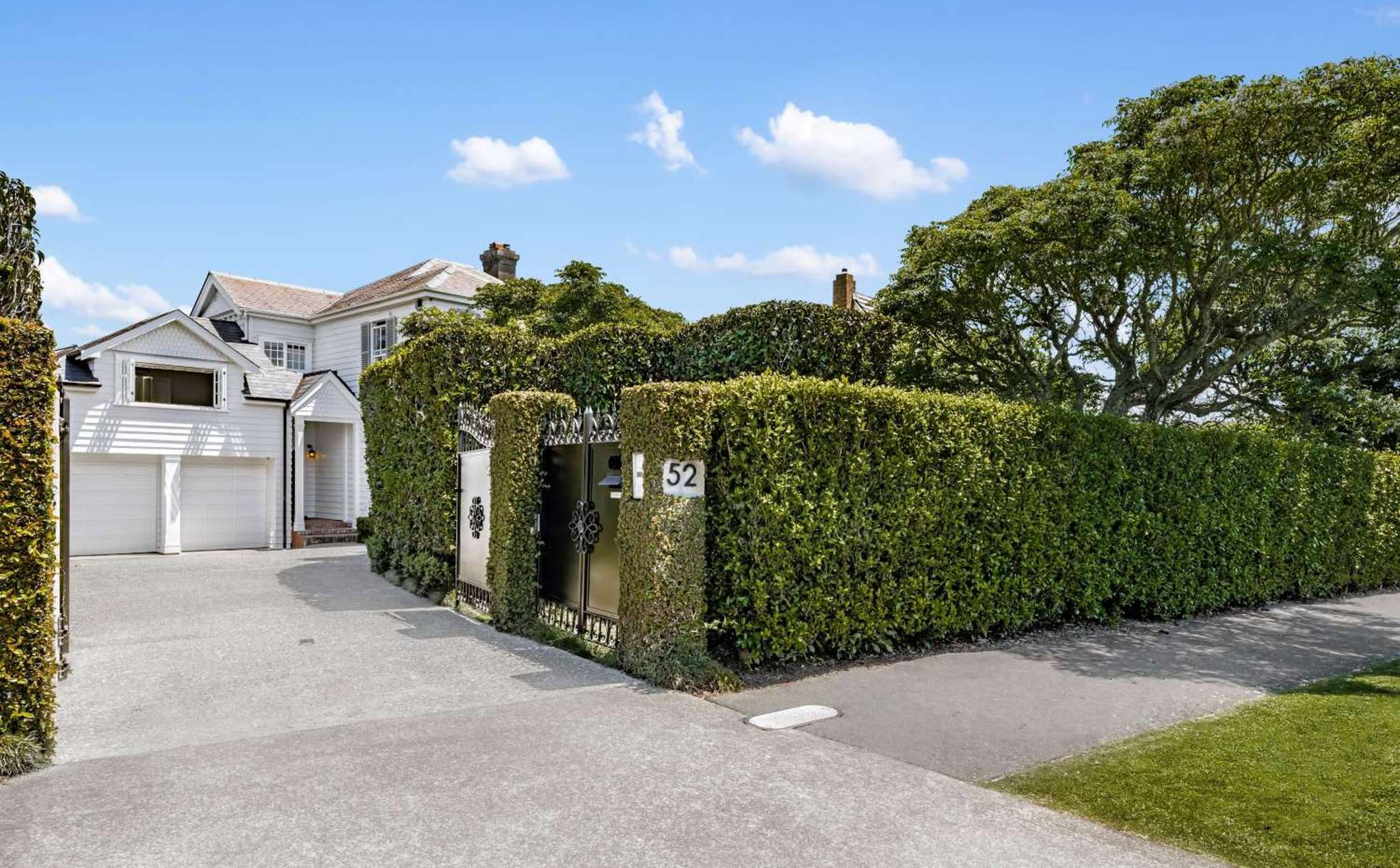 Behind the hedge: The Remuera home hiding a secret library door