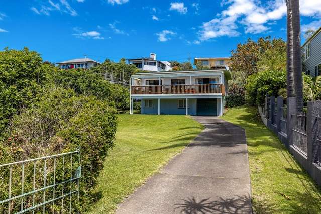 'Lovely' locals buy one of Waiheke's last original beachfront baches for $6.2m