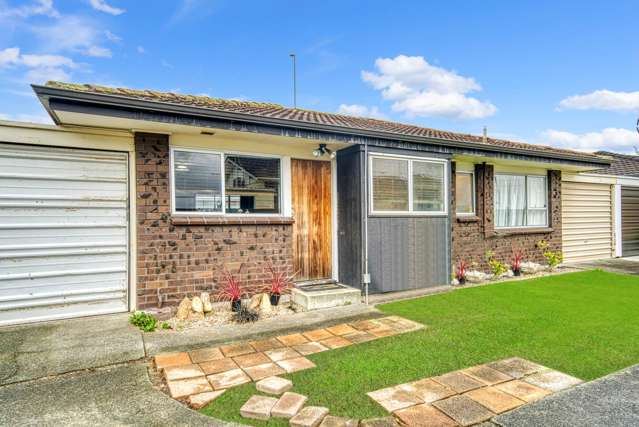 SOLID & SPACIOUS WITH 2 GARAGES