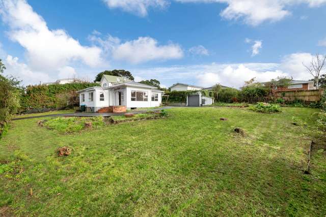 Wide driveway, big land, bigger future