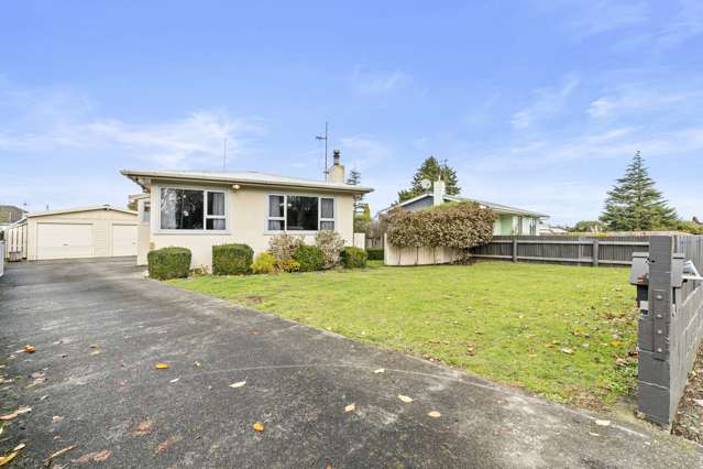 Solid Stucco, Huge Garage & Endless Potential
