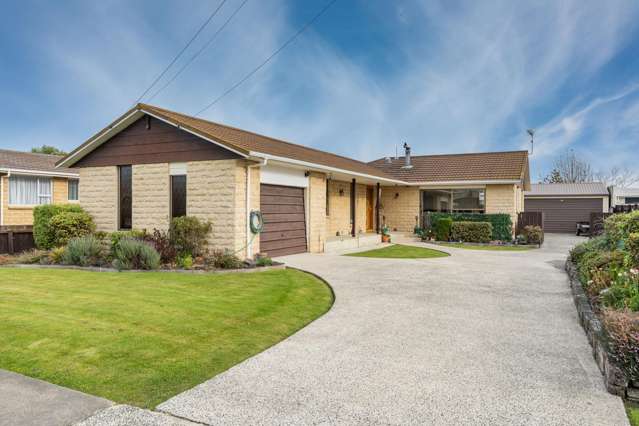 Sun-soaked family living with generous garaging