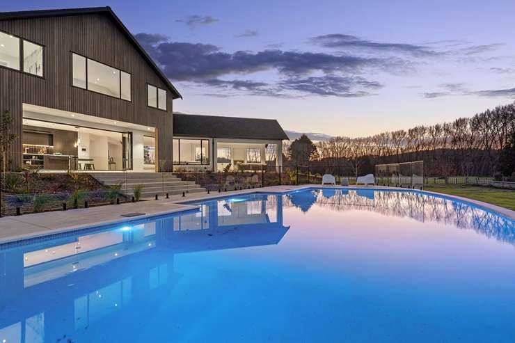 The luxury lodge in Coatesville, Auckland, which sold in November last year. In the top right corner of the photo is the $32.5m mansion that was once home to Kim Dotcom but is now owned by the founders of Zuru Toys. Photo / Supplied