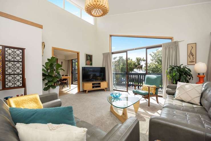 Mark Everton and wife Jo Pilkington's 1970s home at 43a James Evans Drive, in Auckland's Northcote, is heading to auction. Photo / Supplied