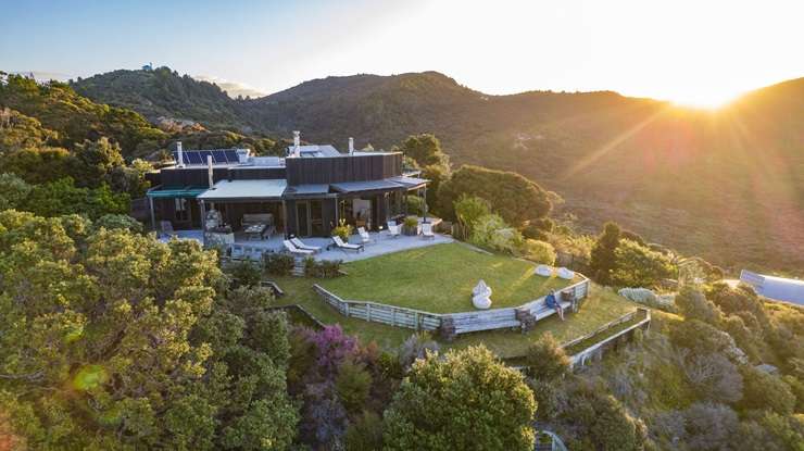 The bach on Aotea Road, on Great Barrier Island, attracted strong buyer interest when it hit the market last year. Photo / Supplied