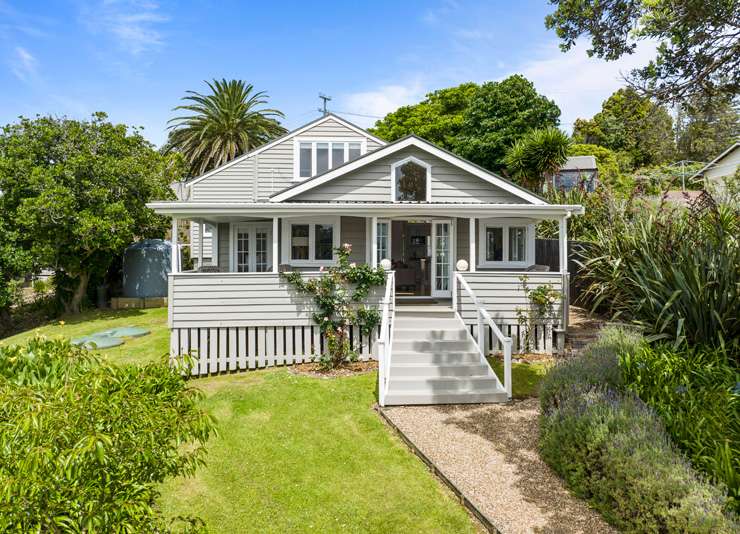 A four-bedroom house on Hill Road, in Palm Beach, with views of the beach and Hauraki Gulf, sold under the hammer for $6.031m. Photo / Supplied