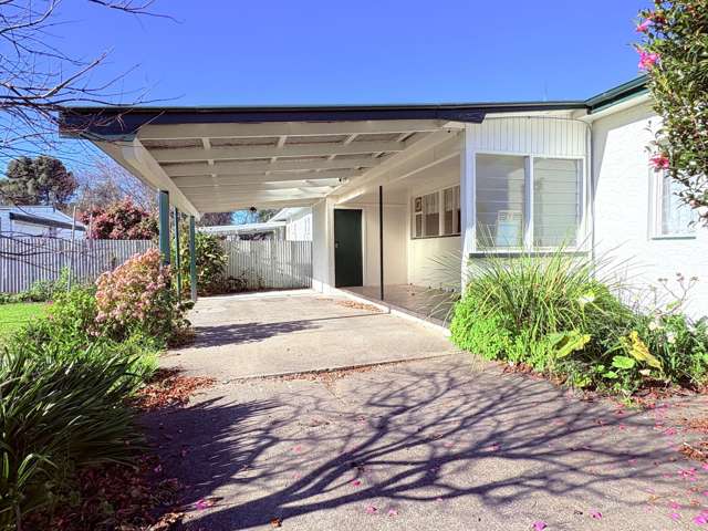 Mid-Century Classic on a Prime Corner Site