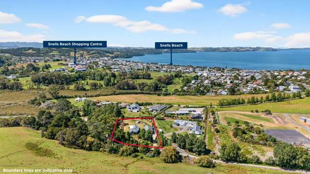 Coastal acre lifestyle, with serious garage space!