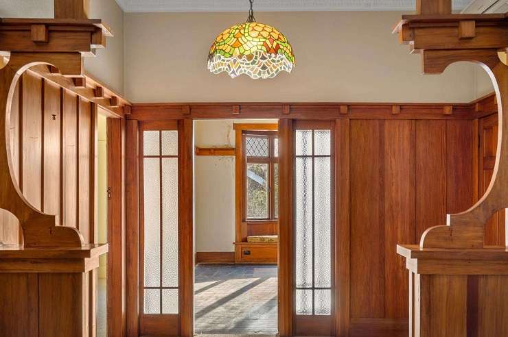 Real estate duo Callum and Anna Piesse decided to get in theme to sell a character 1920s home on Sophia Street, in Glenholme. Photo / Supplied