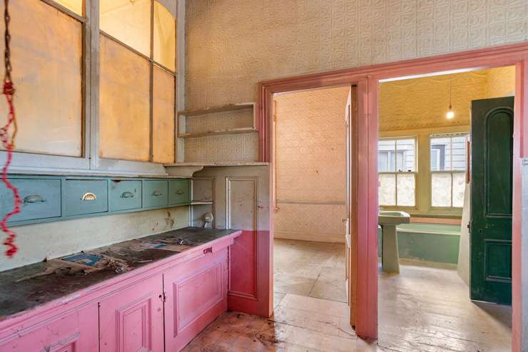 A colourful property at 57 Cardwell Street, in Onehunga, Auckland, goes to auction on February 23. The property's main living area is a striking red. Photo / Supplied