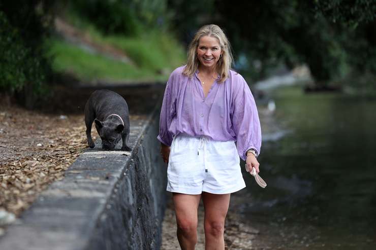 Ray White Mt Eden agent Rachel Berry out with her dog. She says she was obsessed with open homes before becoming an agent. Photo / Fiona Goodall