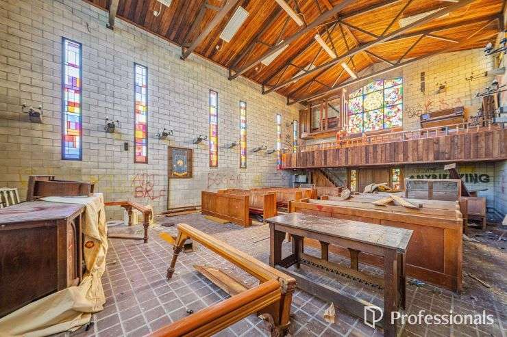Vandals ransacked the former St John's Church building in Wainuiomata. It is now on the market for sale. Photo / Supplied