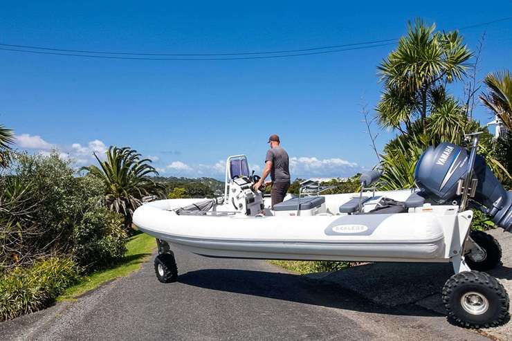 A beachfront property in Arran Bay with its own boatshed and mooring sold under the hammer for $2.765m. Photo / Supplied