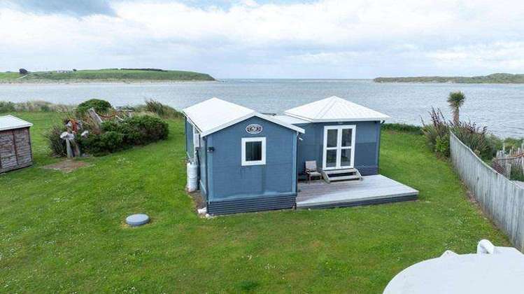 Tiny South Island bach with $100,000 RV smashes it at auction