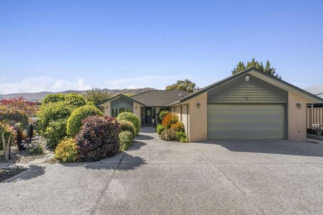 Solid brick, endless parking, garden charm