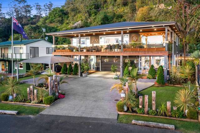 LUXURY WATERFRONT HOME & INCOME