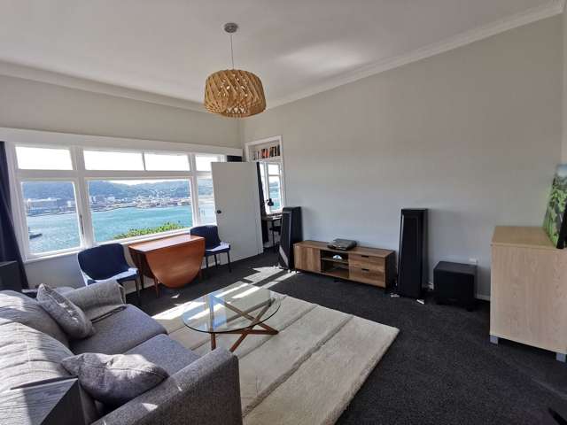Two bedroom plus study with harbour and city view